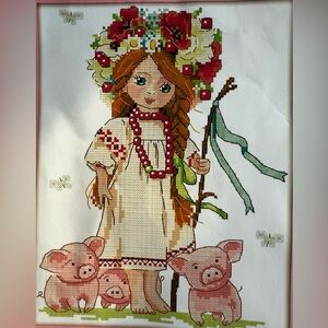 Cross-Stitch Art with Girl and Pigs